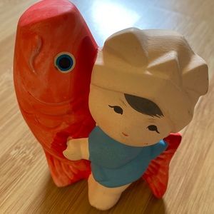Vintage Japanese Ceramic Boy Riding a Red Fish Figurine.